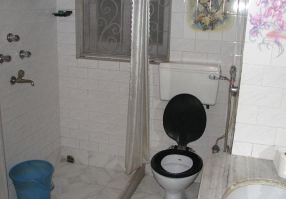 Monorama Guest House Калькутта Номер фото